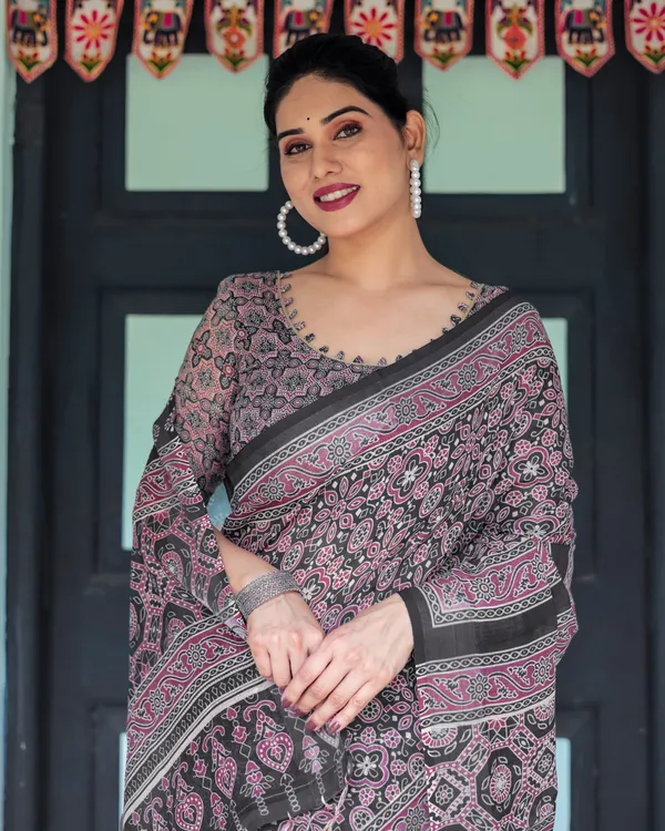 Black_Pure_Cotton_Linen_Saree_with_Pink_Striped_Pallu_and_Tassel_Accents