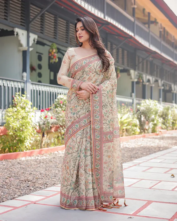 Ivory_Handloom_Cotton-Linen_Saree_with_Floral_and_Peacock_Motifs,_Zari_Highlights,_and_Tassel_Finish