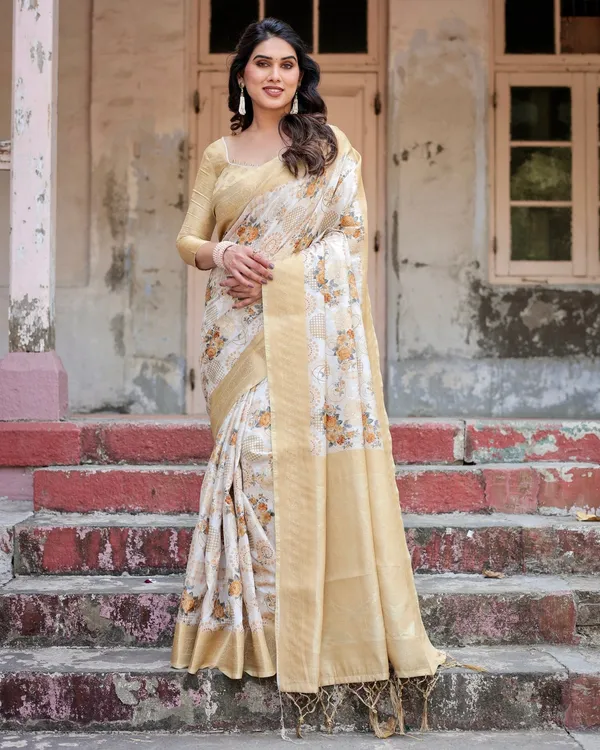 Ivory_and_Gold_Banarasi_Silk_Saree_with_Floral_Print,_Zari_Border,_and_Tassels