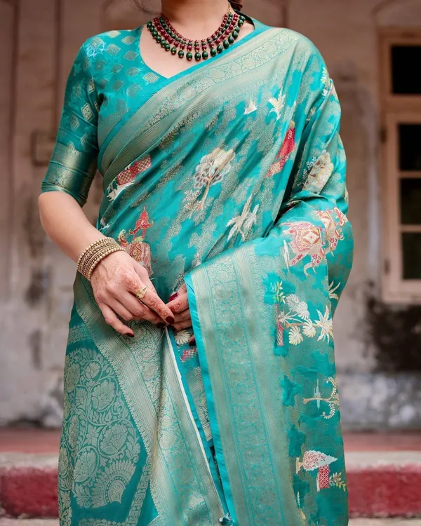 Elegant_Teal_Green_Banarasi_Silk_Saree_with_Intricate_Zari_Weaving_and_Tassels