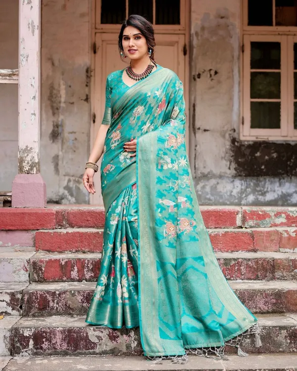 Elegant_Teal_Green_Banarasi_Silk_Saree_with_Intricate_Zari_Weaving_and_Tassels