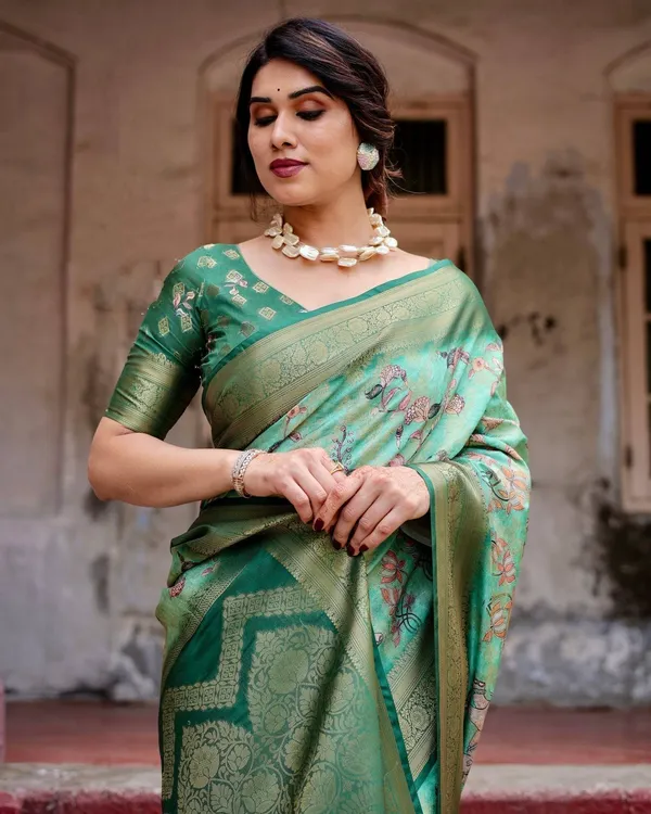 Graceful_Green_Banarasi_Silk_Saree_with_Intricate_Floral_and_Elephant_Weaves