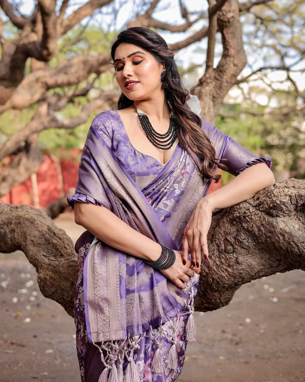 Elegant_Purple_Banarasi_Silk_Saree_with_Floral_Weave,_Zari_Border,_and_Tassels