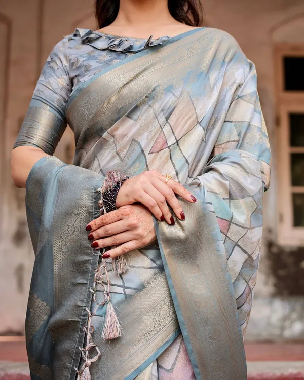 Elegant_Pastel_Blue_Banarasi_Silk_Saree_with_Intricate_Geometric_Design_and_Zari_Work_Tassel_Pallu