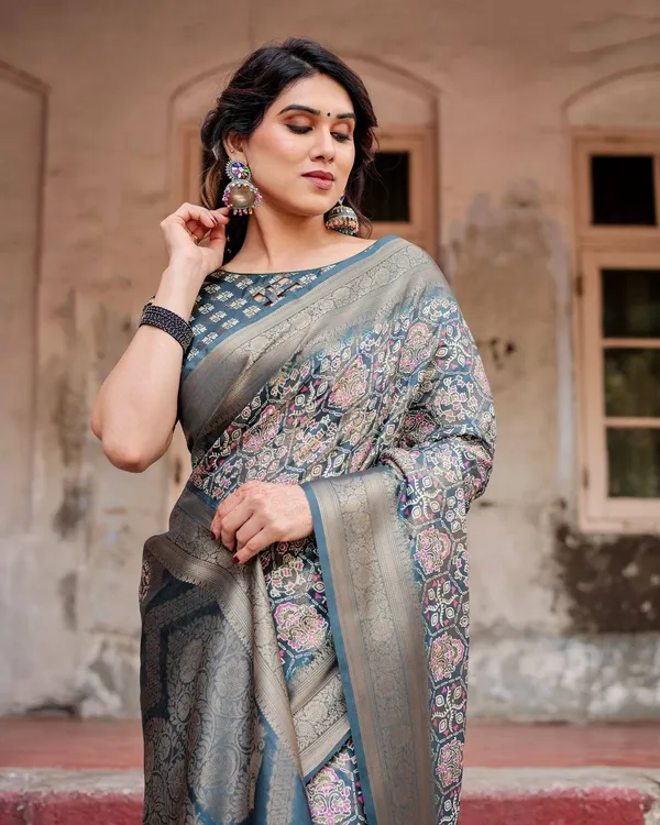 Elegant_Blue_and_Grey_Banarasi_Silk_Saree_with_Intricate_Floral_Patterns,_Zari_Woven_Borders,_and_Tassel_Accents