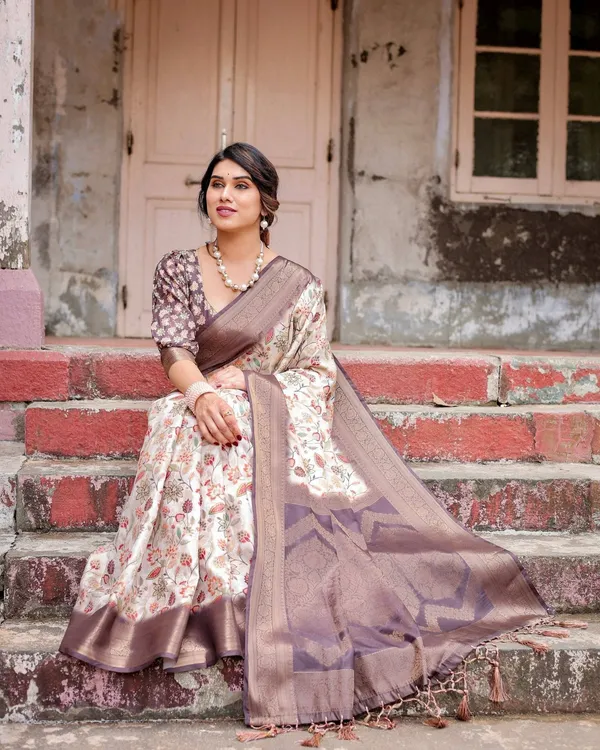 Ivory_Banarasi_Silk_Saree_with_Plum_Zari_Border,_Floral_Print,_and_Tassels