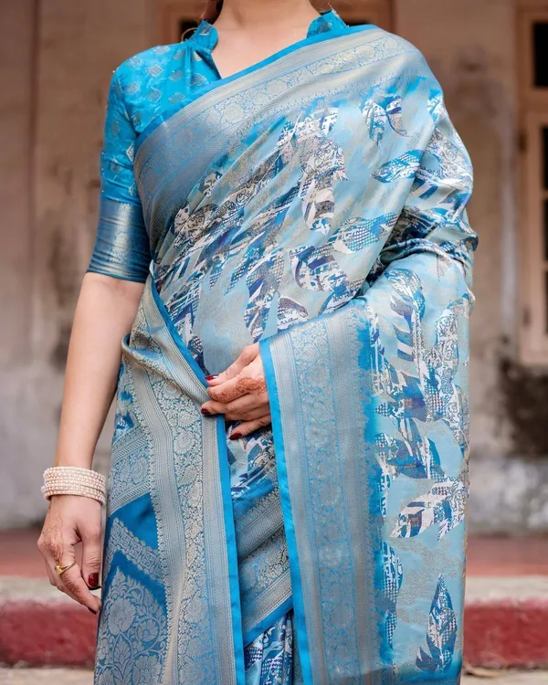 Aqua_Blue_Banarasi_Silk_Saree_with_Zari_Border,_Floral_Motifs,_and_Tassels