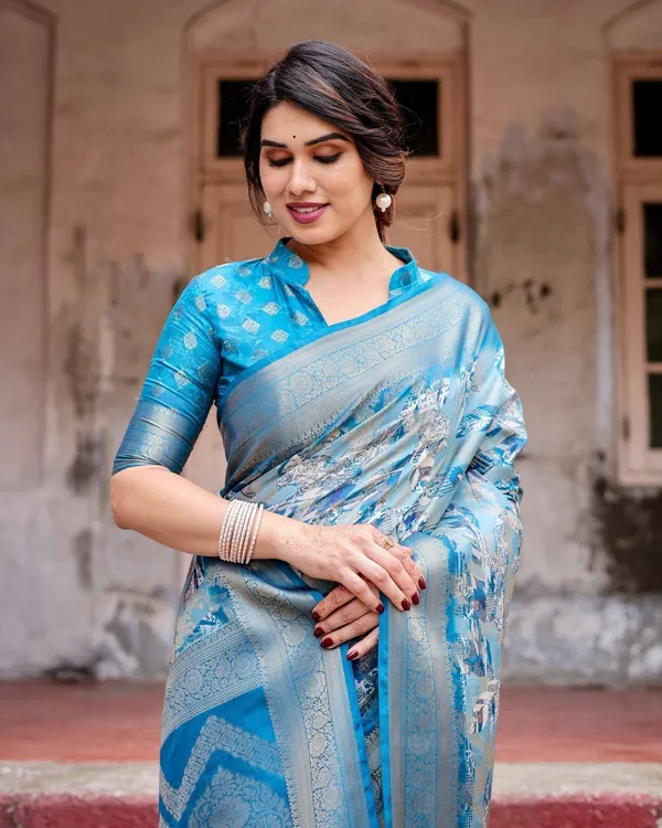 Aqua_Blue_Banarasi_Silk_Saree_with_Zari_Border,_Floral_Motifs,_and_Tassels