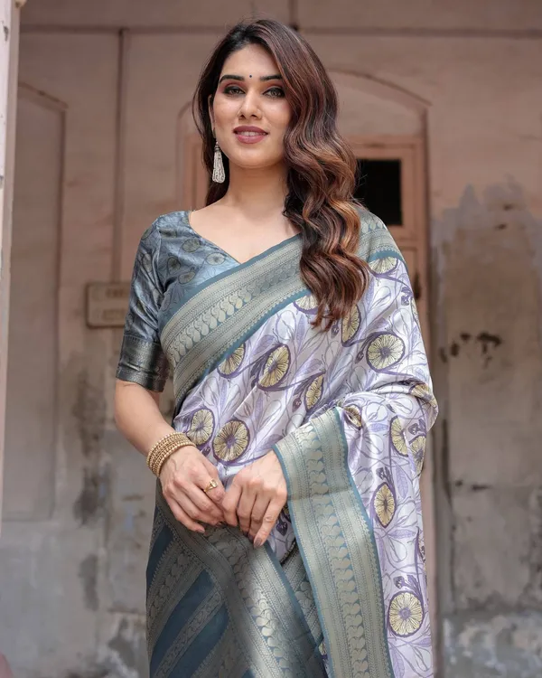 Sophisticated_Lilac_Banarasi_Silk_Saree_with_Floral_Prints_and_Zari_Tassel_Border