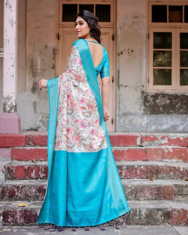 White_and_Aqua_Floral_Design_Banarasi_Silk_Saree_with_Zari_Weave_and_Tassel-Embellished_Pallu