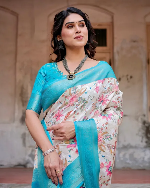 White_and_Aqua_Floral_Design_Banarasi_Silk_Saree_with_Zari_Weave_and_Tassel-Embellished_Pallu
