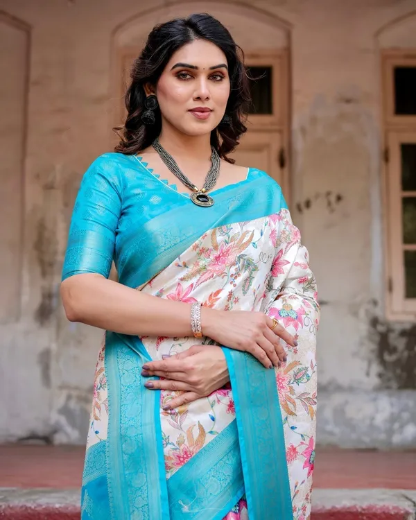 White_and_Aqua_Floral_Design_Banarasi_Silk_Saree_with_Zari_Weave_and_Tassel-Embellished_Pallu
