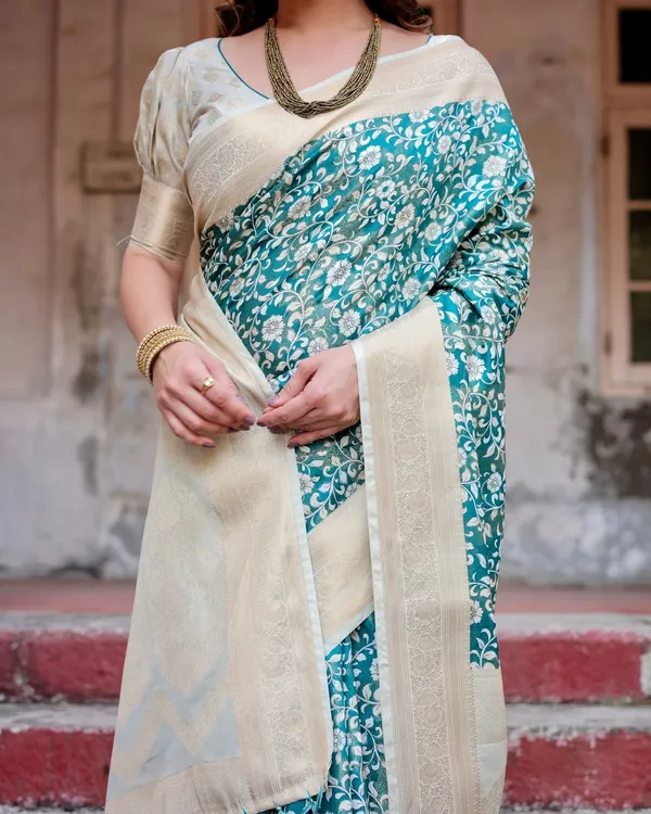 Teal_and_Cream_Floral_Banarasi_Silk_Saree_with_Zari_Weave_and_Tassel-Accented_Pallu