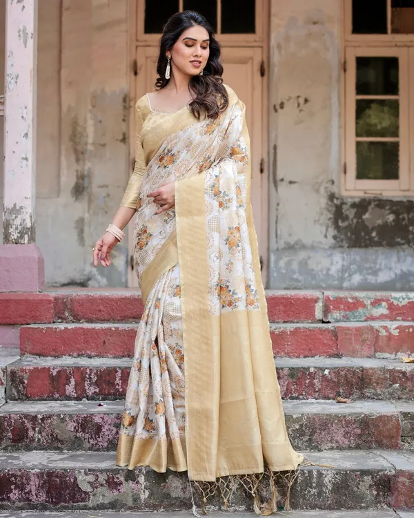 Ivory_and_Gold_Banarasi_Silk_Saree_with_Floral_Print,_Zari_Border,_and_Tassels