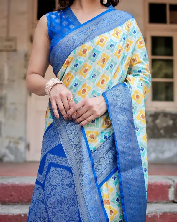 Yellow_and_Blue_Ikat_Digital_Print_Banarasi_Silk_Saree_with_Zari_Weave_and_Tassel-Embellished_Pallu
