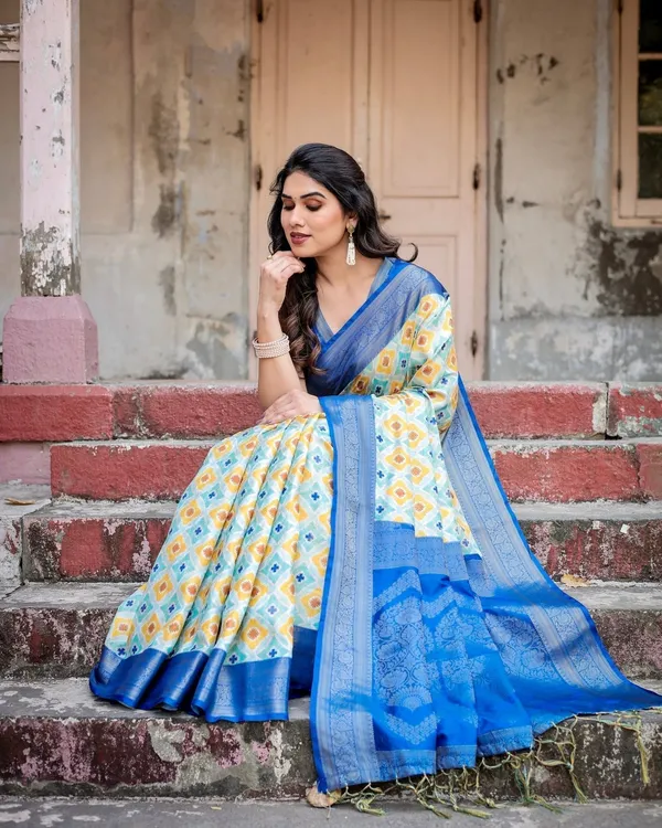Yellow_and_Blue_Ikat_Digital_Print_Banarasi_Silk_Saree_with_Zari_Weave_and_Tassel-Embellished_Pallu