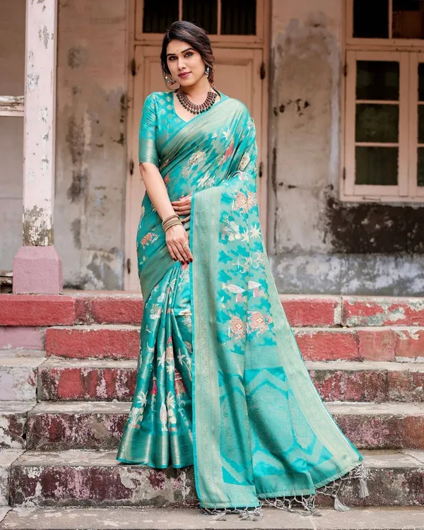 Elegant_Teal_Green_Banarasi_Silk_Saree_with_Intricate_Zari_Weaving_and_Tassels