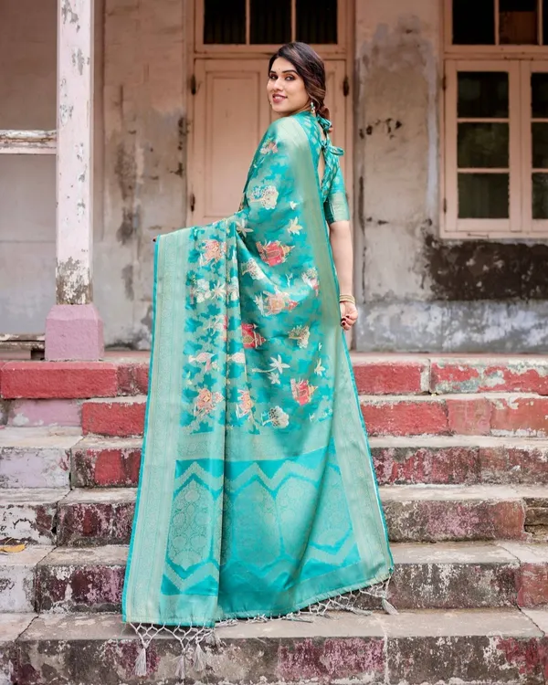 Elegant_Teal_Green_Banarasi_Silk_Saree_with_Intricate_Zari_Weaving_and_Tassels