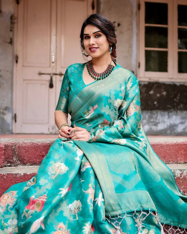 Elegant_Teal_Green_Banarasi_Silk_Saree_with_Intricate_Zari_Weaving_and_Tassels