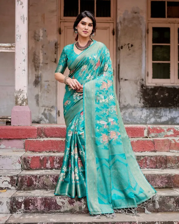 Elegant_Teal_Green_Banarasi_Silk_Saree_with_Intricate_Zari_Weaving_and_Tassels