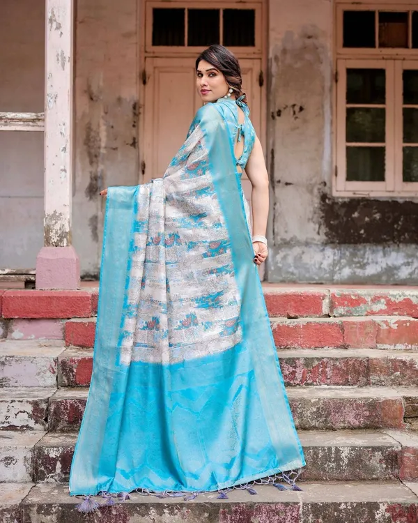 Sky_Blue_Banarasi_Silk_Saree_with_Paisley_Digital_Print,_Zari_Border_&_Tassel_Details