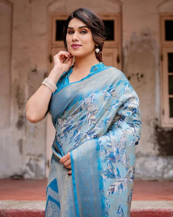 Aqua_Blue_Banarasi_Silk_Saree_with_Zari_Border,_Floral_Motifs,_and_Tassels