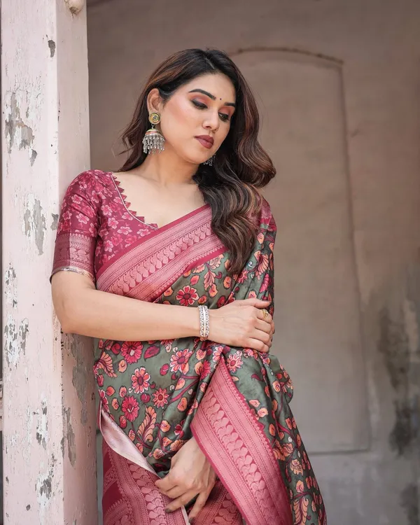 Luxurious_Green_Banarasi_Silk_Saree_with_Zari_Border_and_Tassels