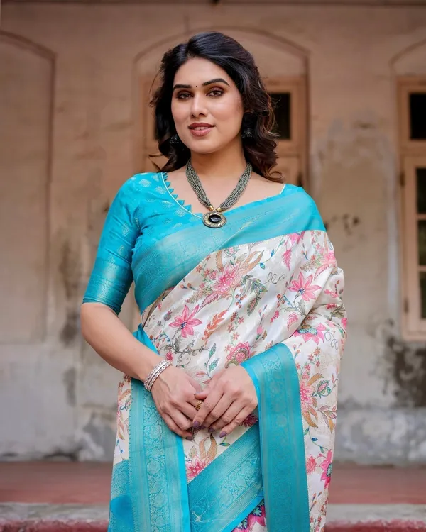 White_and_Aqua_Floral_Design_Banarasi_Silk_Saree_with_Zari_Weave_and_Tassel-Embellished_Pallu