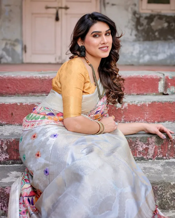 Off-White_and_Multicolor_Mandala_Design_Banarasi_Silk_Saree_with_Zari_Weave_and_Tassel-Adorned_Pallu