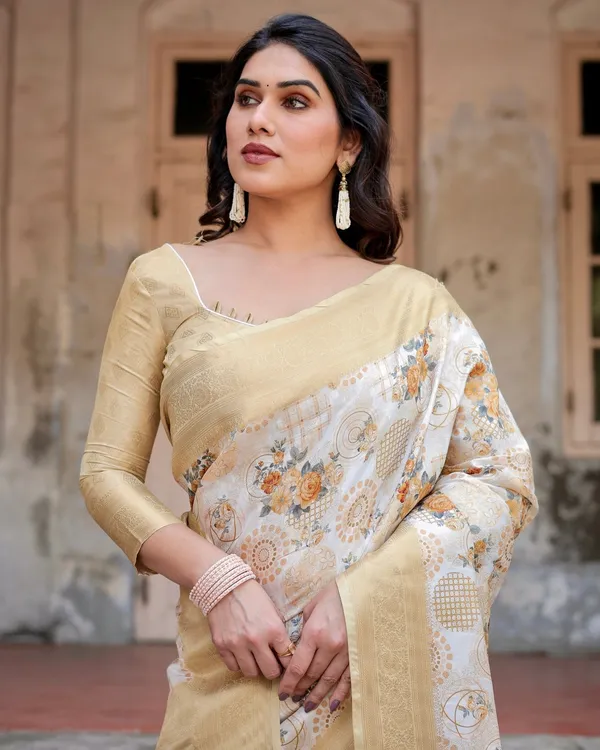 Ivory_and_Gold_Banarasi_Silk_Saree_with_Floral_Print,_Zari_Border,_and_Tassels