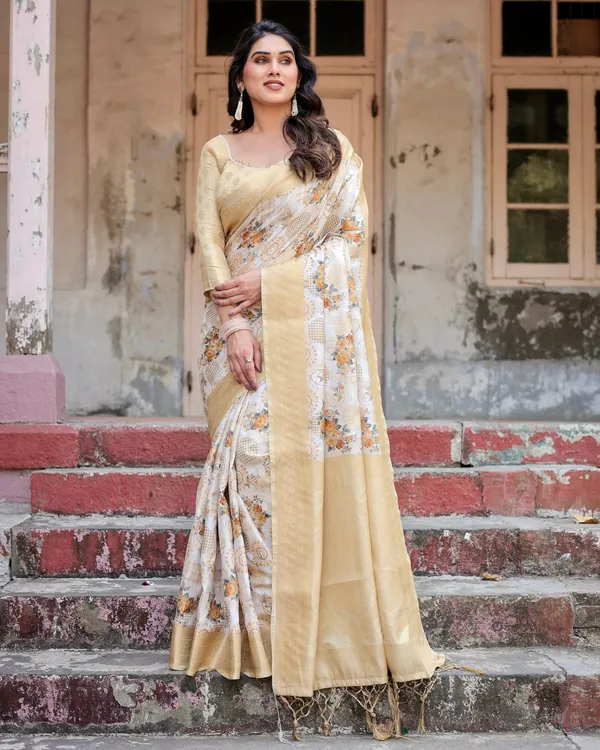 Ivory_and_Gold_Banarasi_Silk_Saree_with_Floral_Print,_Zari_Border,_and_Tassels