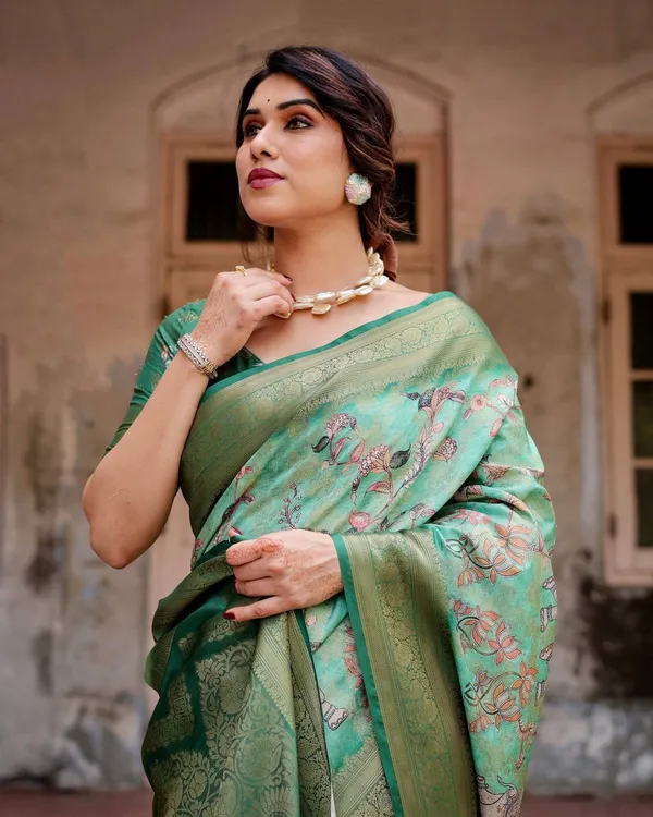 Graceful_Green_Banarasi_Silk_Saree_with_Intricate_Floral_and_Elephant_Weaves
