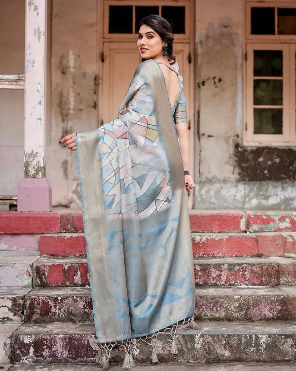 Elegant_Pastel_Blue_Banarasi_Silk_Saree_with_Intricate_Geometric_Design_and_Zari_Work_Tassel_Pallu