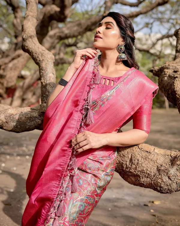 Elegant_Pink_Banarasi_Silk_Saree_with_Paisley_Design,_Zari_Weaving,_and_Tassels