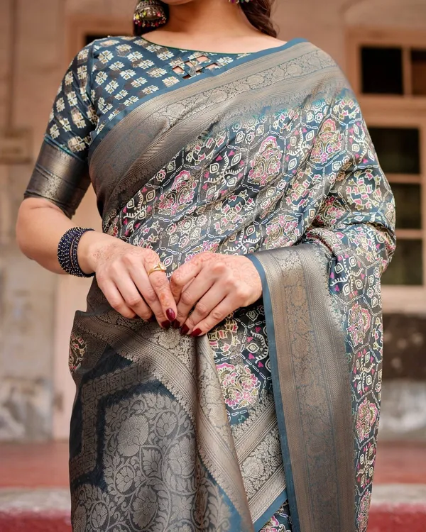 Elegant_Blue_and_Grey_Banarasi_Silk_Saree_with_Intricate_Floral_Patterns,_Zari_Woven_Borders,_and_Tassel_Accents