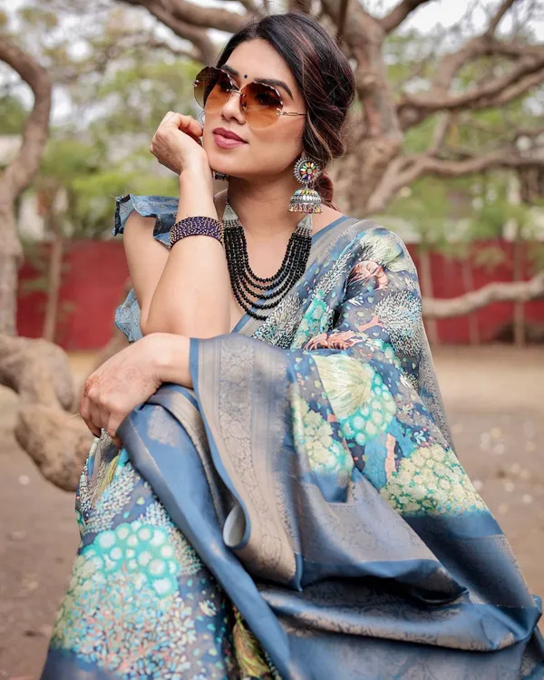 Graceful_Navy_Blue_Banarasi_Silk_Saree_with_Nature-Inspired_Digital_Prints_and_Elegant_Zari_Woven_Border