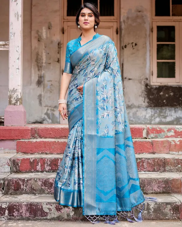 Aqua_Blue_Banarasi_Silk_Saree_with_Zari_Border,_Floral_Motifs,_and_Tassels