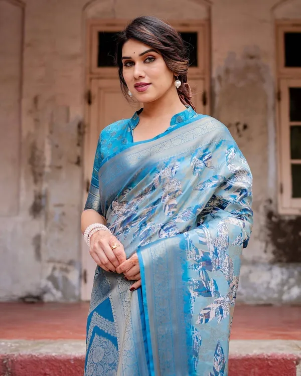Aqua_Blue_Banarasi_Silk_Saree_with_Zari_Border,_Floral_Motifs,_and_Tassels