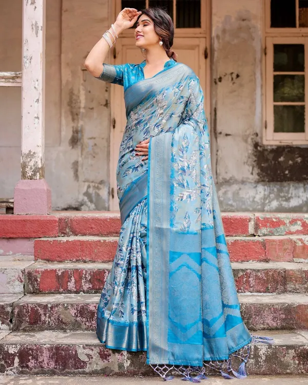 Aqua_Blue_Banarasi_Silk_Saree_with_Zari_Border,_Floral_Motifs,_and_Tassels