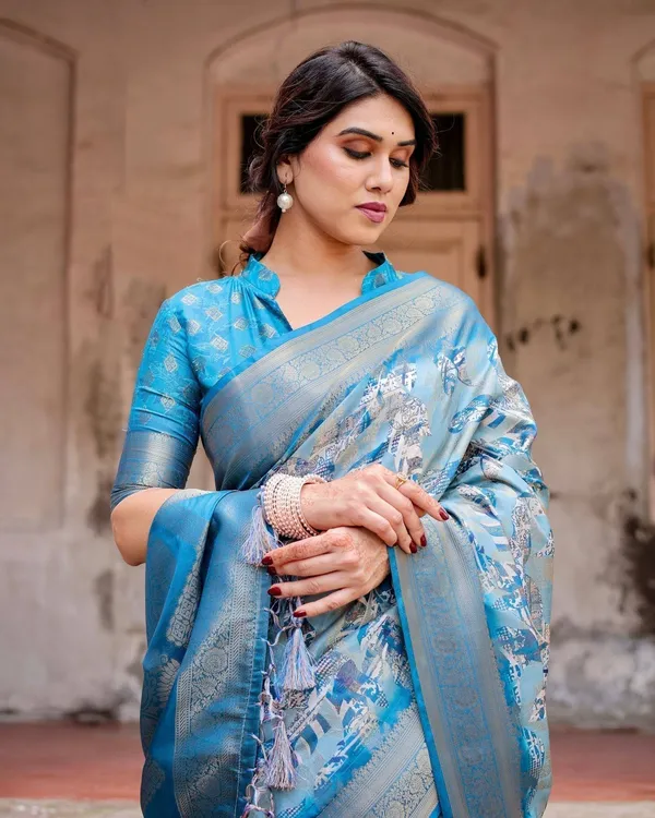 Aqua_Blue_Banarasi_Silk_Saree_with_Zari_Border,_Floral_Motifs,_and_Tassels