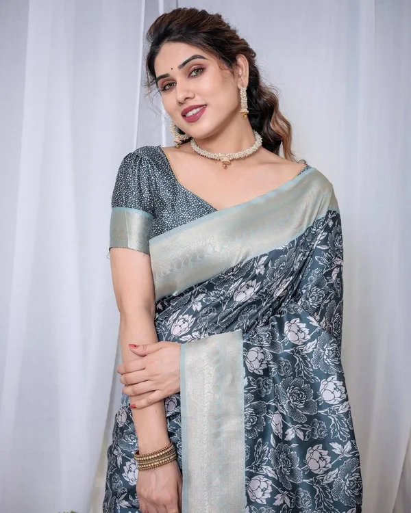 Timeless_Blue_and_Silver_Banarasi_Silk_Saree_with_Floral_Design_and_Tassels