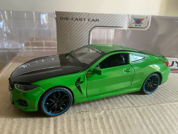 BMW_M8_1:24_Scale_Diecast_Model_Car_-_Alloy_Metal_Toy_Car_with_Opening_Doors,_Hood_&_Trunk,_Sound_&_Light_Multicolour_(As_per_availability_)