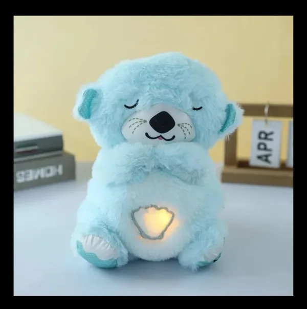 Teddy_bear_holding_a_heart,_featuring_LED_lights_with_flashing_modes_comes_in_a_display_box,_making_it_a_perfect_gift.