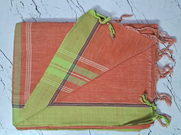 GREEN_&_ORANGE_COLOUR_COTTON_SAREE_WITH_BLOUSE_PIECE
