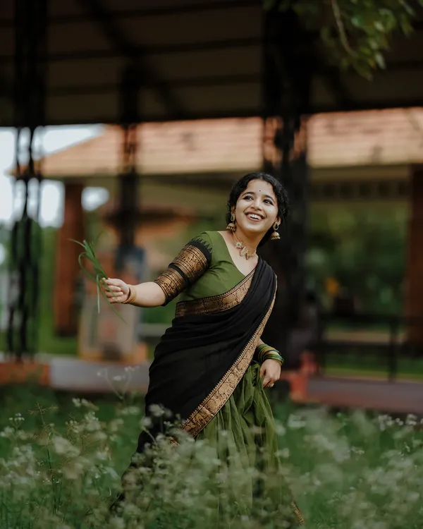 Mehndi-Black_Kanjiveram_Silk_Zari_Lehenga_With_Blouse_Along_With_Banarsi_Silk_Dupatta