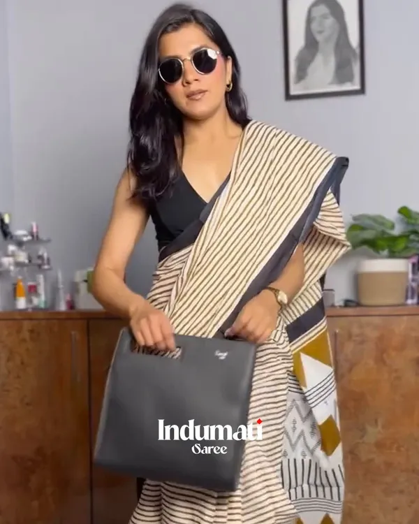 Ivory_Ink_-_Cream_Linen_Saree_with_Lining_Pattern,_Black_Border_&_Blouse