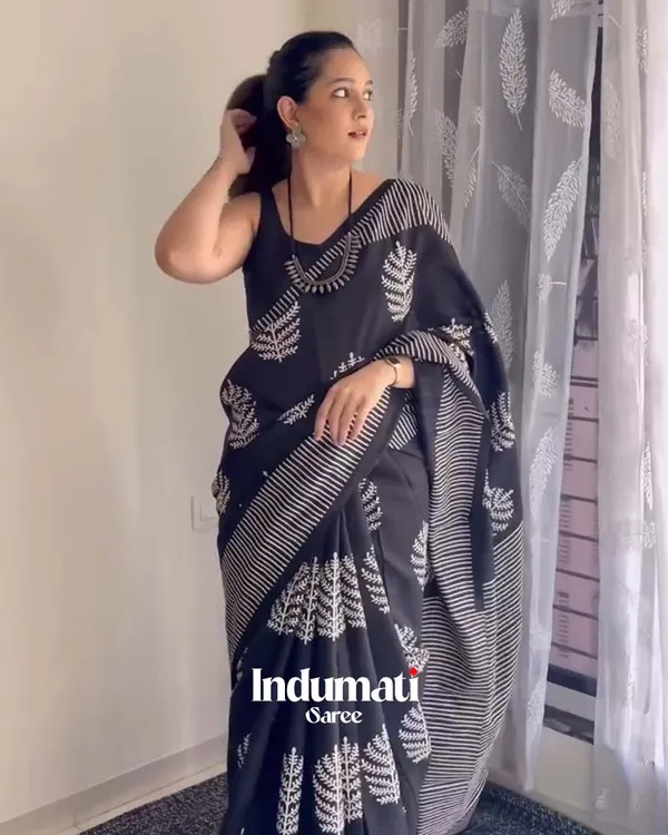 Shadow_Petals_-_Black_Linen_Saree_with_Black_Blouse_and_Floral_Accent