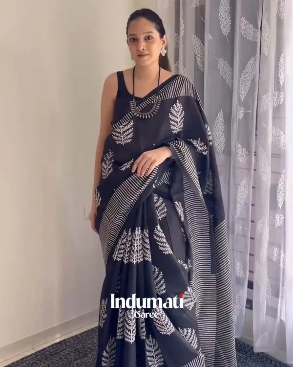 Shadow_Petals_-_Black_Linen_Saree_with_Black_Blouse_and_Floral_Accent