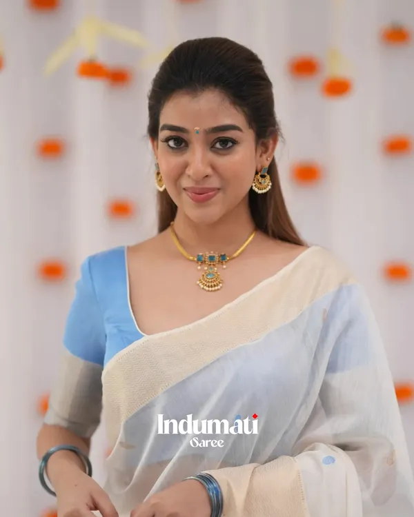 White_Color_Luxury_Edition_Soft_Banarasi_Silk_Saree_with_Classy_Sky_Blue_Color_Blouse_Piece