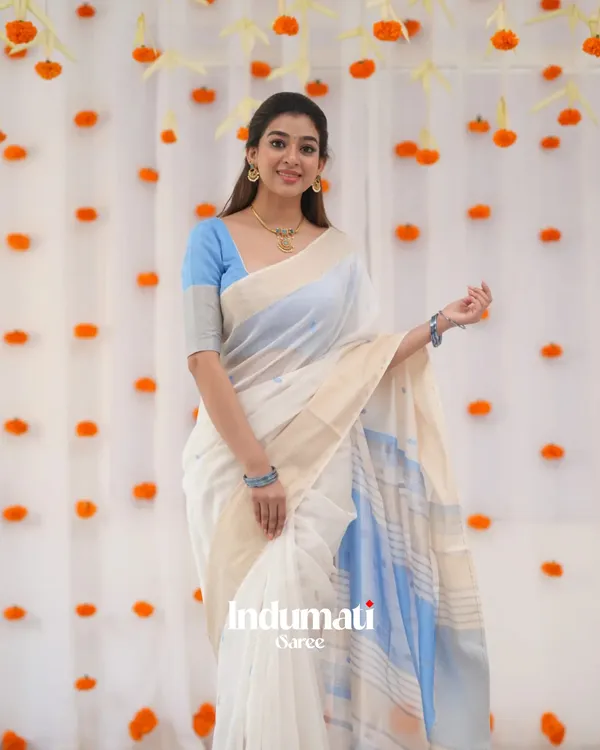 White_Color_Luxury_Edition_Soft_Banarasi_Silk_Saree_with_Classy_Sky_Blue_Color_Blouse_Piece